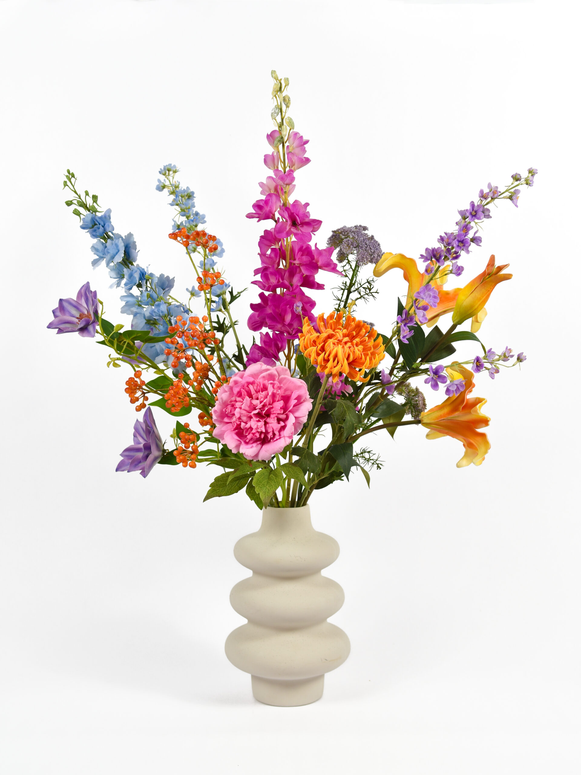 Kunstboeket Suze XL Real touch. Paars, blauw, oranje en roze